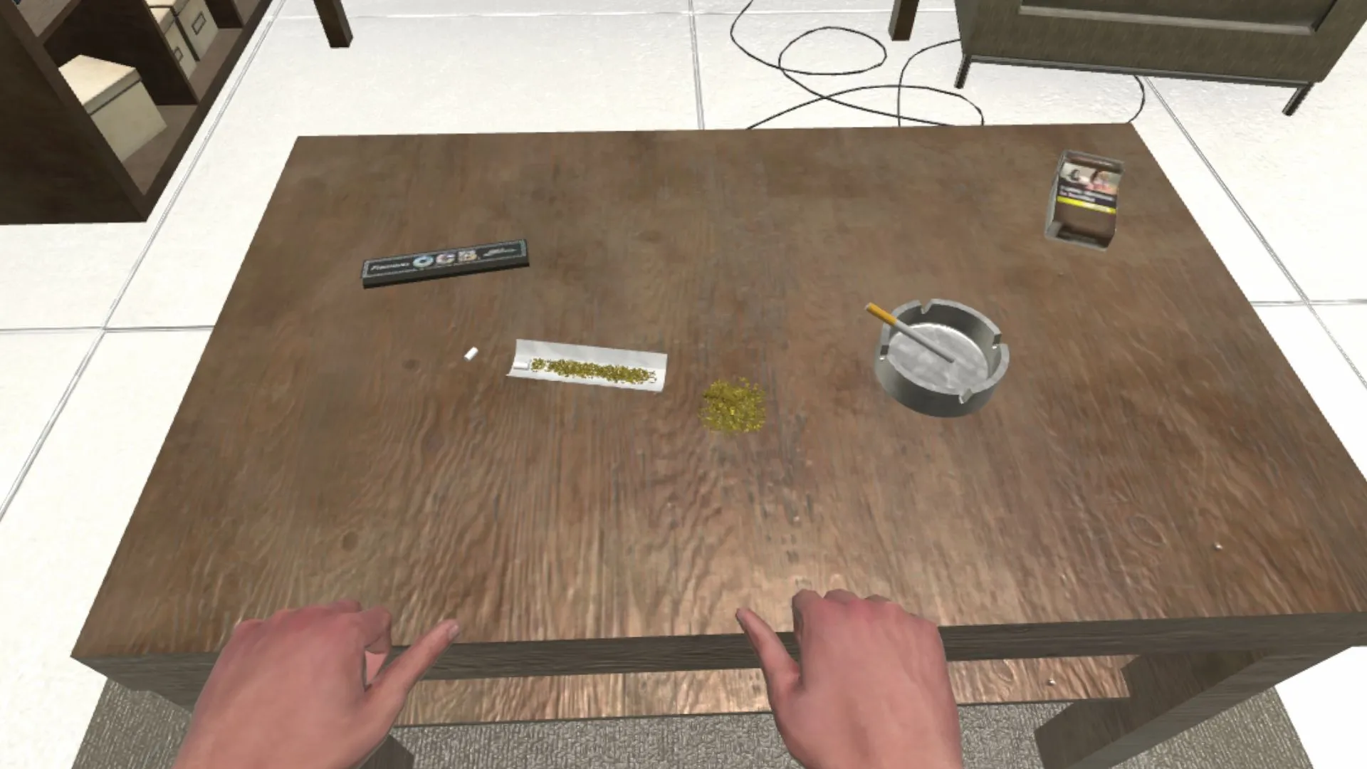 Cannabis y accesorios sobre una mesa de un apartamento
