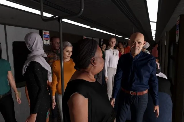 Passengers standing in a crowded subway car