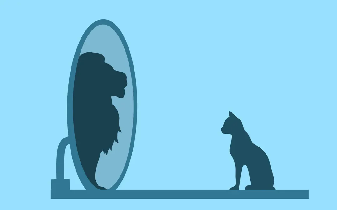 Silhouette of a cat seeing itself as a lion in a mirror