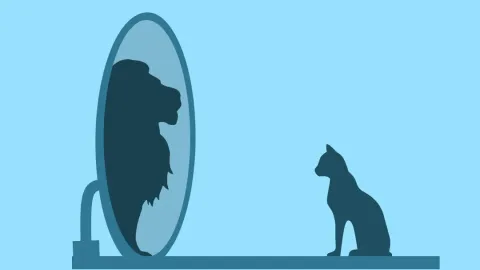 Silhouette einer Katze, die sich im Spiegel als Löwe sieht
