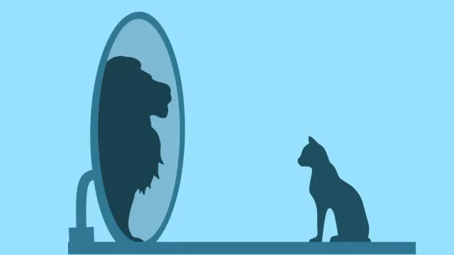 Silhouette einer Katze, die sich im Spiegel als Löwe sieht