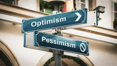 Wegweiser in Richtung Optimismus und Pessimismus