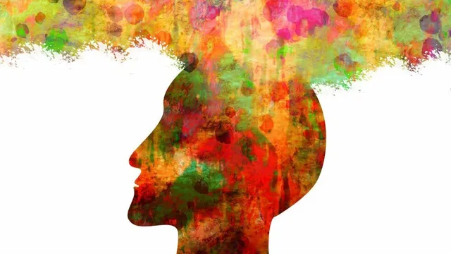 Silhouette eines Gesichts, gefüllt mit abstrakten Farben