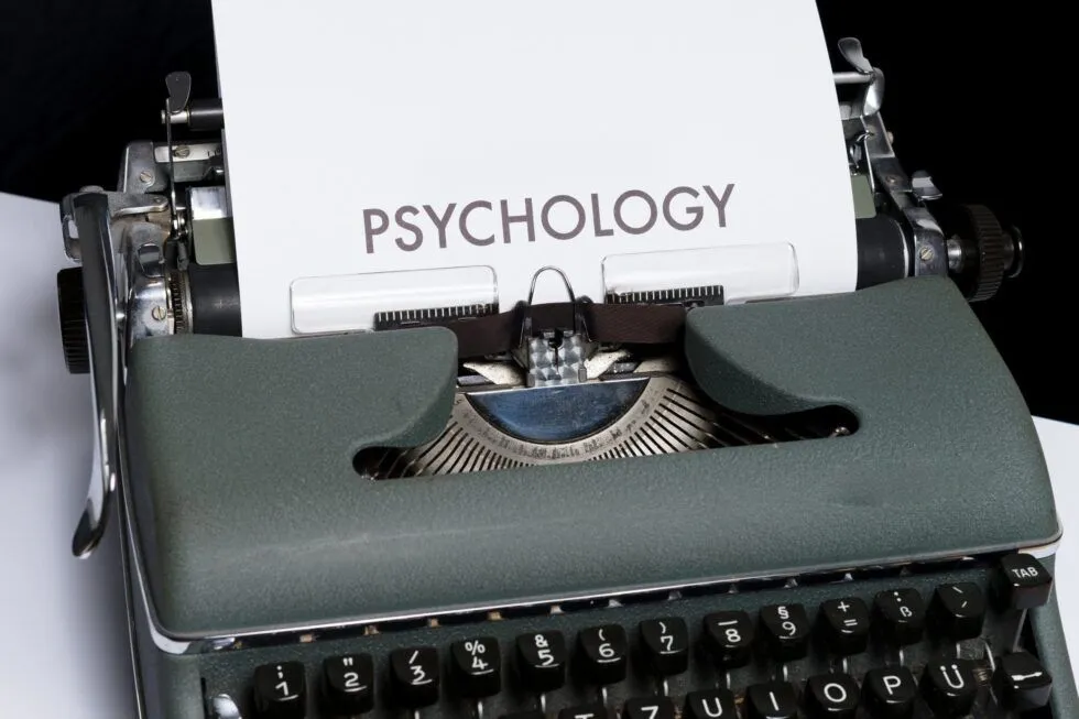 Typewriter displaying the word “Psychology”