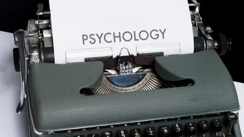 Typewriter displaying the word “Psychology”